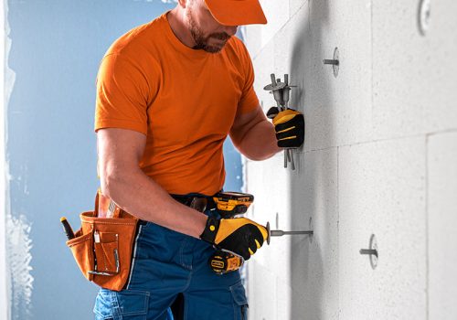 nserting a dowel for thermal insulation to the drilling hole in nserting a dowel for thermal insulation to the drilling hole in